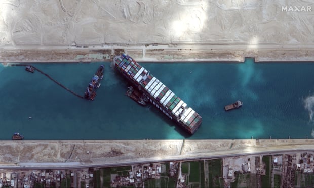 A satellite image shows the cargo ship MV Ever Given stuck in the Suez canal.