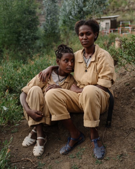 Ayehy, right, with arm round Asefg