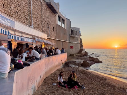 Sunset at Le Cabanon de Paulette bar people drinking
