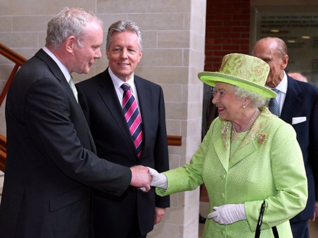 Queen Elizabeth II shakes hands with Northern Ireland Deputy First Minister Martin McGuinness