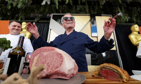 Massive ham … Wolfgang Puck with a preview of some of the food on offer at this year’s post-Oscars Governors Ball.