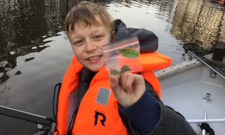 Gus Krohn having fished out ‘Dr Grinspoon’ from the canals of Amsterdam, a small plastic bag of weed.