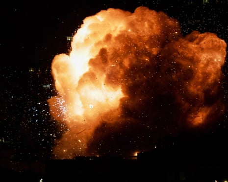 An explosion is seen as a missile hits a building in Tel Aviv, Israel.