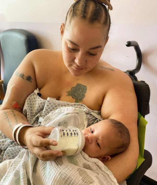 Grace Victory feeding her son Cyprus for the first time when she was still in hospital