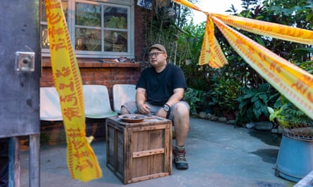 Laio Xiu Bo outside his house in Hualien