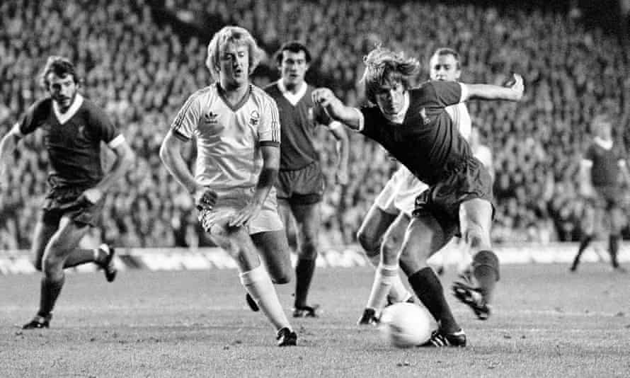 Liverpool's Kenny Dalglish shoots under pressure from Kenny Burns of Nottingham Forest during the European Cup first round second leg at Anfield in September 1978.