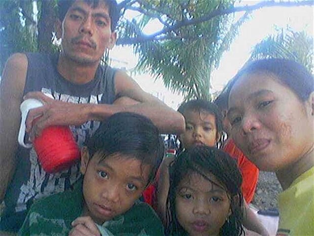 Edelyn with her husband Crisanto and children Chris, Crislyn and Christine