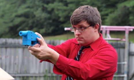 A software engineer aims a 3D-printed gun. Officials fear the weapons will allow users to work around gun laws.