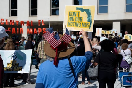 a person holding a sign