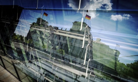 The Reichstag reflected in a Berlin window.