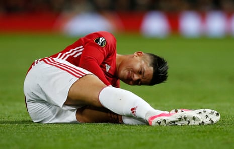 Marcos Rojo sustains an injury and is taken off.