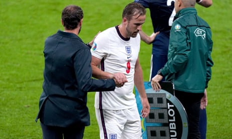 Harry Kane shakes hands with Gareth Southgate after being substituted during England’s goalless draw with Scotland.