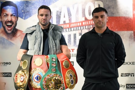 Taylor shows off his belts at a press event with Catterall, who he fights in Glasgow.