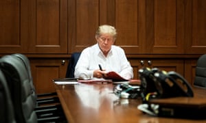 U.S. President Donald Trump works in a conference room while receiving treatment after testing positive for the coronavirus disease (COVID-19) at Walter Reed National Military Medical Center in Bethesda, Maryland, U.S. October 3, 2020. Joyce N. Boghosia/The White House/Handout via REUTERS ATTENTION EDITORS - THIS IMAGE HAS BEEN SUPPLIED BY A THIRD PARTY. TPX IMAGES OF THE DAY