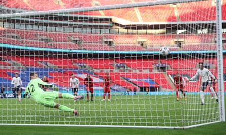 Marcus Rashford scores from the spot to equalise for England at an empty Wembley
