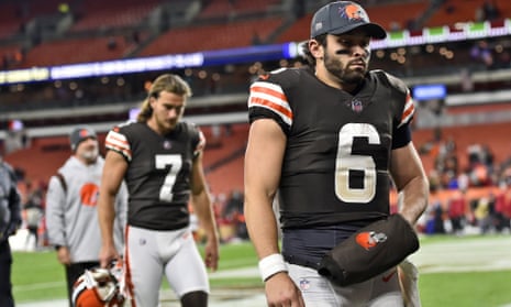 Baker Mayfield walks off the field after Sunday’s loss to the Cardinals