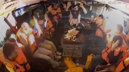 People wearing lifejackets onboard the Madleen boat