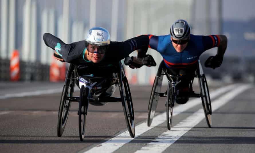 Marcel Hug and David Weir cross a bridge during the men’s wheelchair race at the New York Marathon.