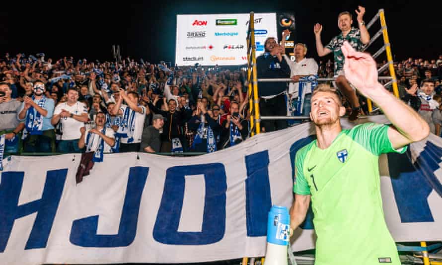 Lukas Hradecky leads the fans’ celebrations after Finland beat Hungary in the Nations League.