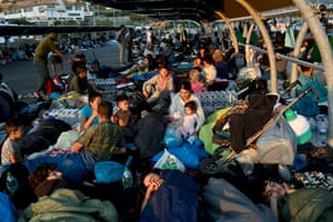 Mytilene, Greece Refugees find shelter outside a supermarket close to Mytilene, after a fire destroyed Moria refugee camp on the island of Lesbos