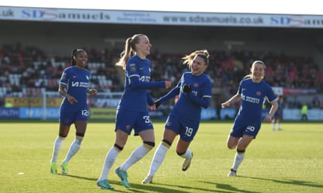 Aggie Beever-Jones receives congratulations after giving Chelsea the lead