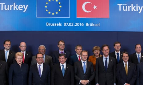 Turkish prime minister Ahmet Davutoğlu poses with European Union leaders during the summit in Brussels,