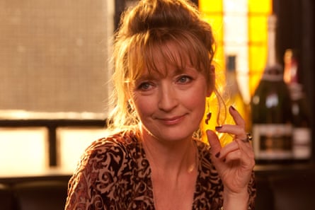 The actor Lesley Manville in front of a yellow window in Mike Leigh’s Another Year.