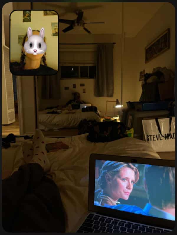 a scene from The OC plays on a laptop in a bedroom, with an inset photo that shows the author’s face covered by a rabbit emoji