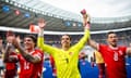 From left to right: Steven Zuber, Yann Sommer and Remo Freuler celebrate in front of the Switzerland fans after defeating Italy in the Euro 2024 last-16 match
