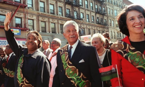 David Dinkins (centre), marches in the annual African American Day parade in Harlem in September 1997 flanked by Al Sharpton (left) and Ruth Messinger