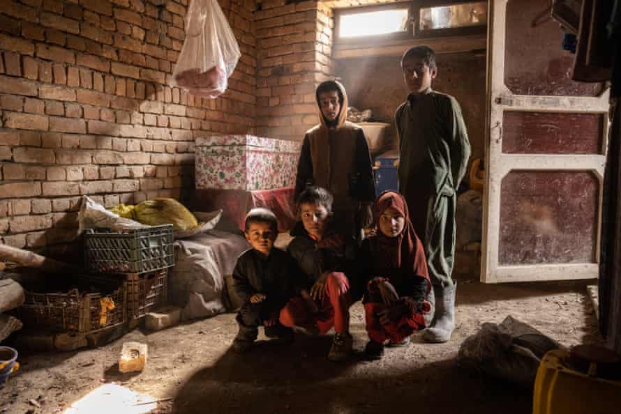 Delagha, his father, wife and children