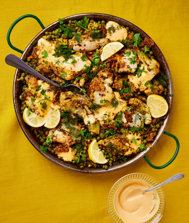 Thomasina Miers’ turmeric chicken rice with peas and habanero allioli. Photograph: Louise Hagger/The Guardian. Food styling: Emily Kydd. Prop styling: Jennifer Kay. Food styling assistant: Lola Salome Smadja Thomasina Miers’ turmeric chicken rice with peas and habanero allioli. Photograph: Louise Hagger/The Guardian. Food styling: Emily Kydd. Prop styling: Jennifer Kay. Food styling assistant: Lola Salome Smadja