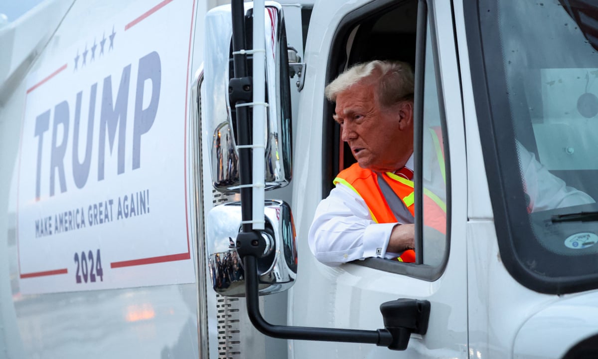 Trump stages garbage truck stunt in bid to turn tables over Puerto Rico backlash | US elections 2024 | The Guardian