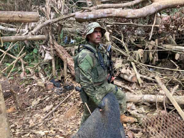 Ibama agent Rafael Sant’Ana dismantles a wooden sluice used to separate gold from dirt
