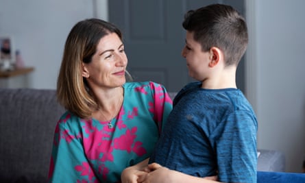 Enka Plaku at home with her son