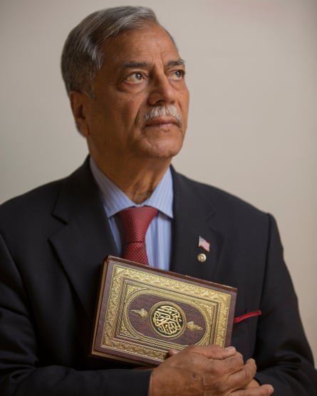 Chaudry holding his copy of the Qur’an.