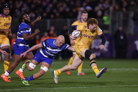 George Hendy of Northampton Saints gets away from Bath’s Miles Reid