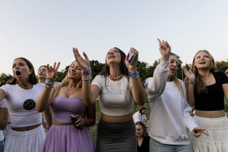 Taylor Swift fans sing outside the National Stadium in Warsaw, Poland, on 1 August.