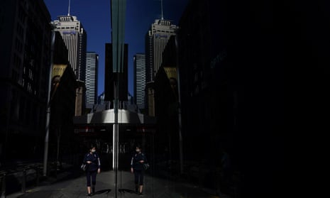 A pedestrian walks through the city centre during Sydney’s Covid lockdown