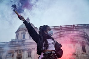 A woman at a rally in Rome, one of many held around the world to mark International Women’s Day