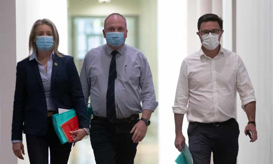 Nationals leader Barnaby Joyce, Deputy David Littleproud and Nationals senate Leader Bridget McKenzie make their way to a Nationals party room