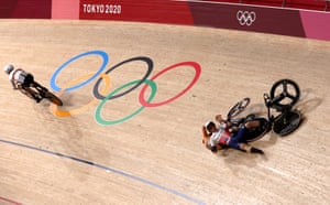 Laurine van Riessen of the Netherlands and Katy Marchant of Britain crash in the women’s keirin in Shizuoka, Japan