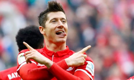 Robert Lewandowski fired up Bayern Munich’s title charge with two goals against Eintracht Frankfurt after a slow start by the champions.