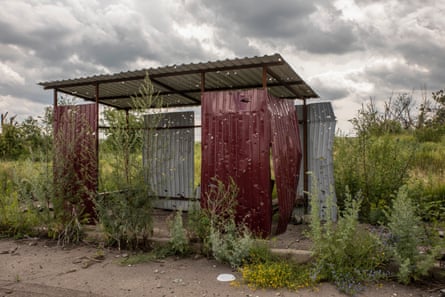 A bus stop hit by artillery in the village of Dementiivka.