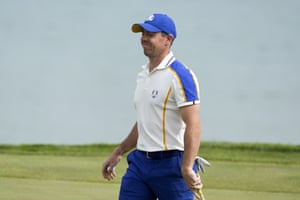 Team Europe’s Rory McIlroy reacts to a missed putt on the third hole.