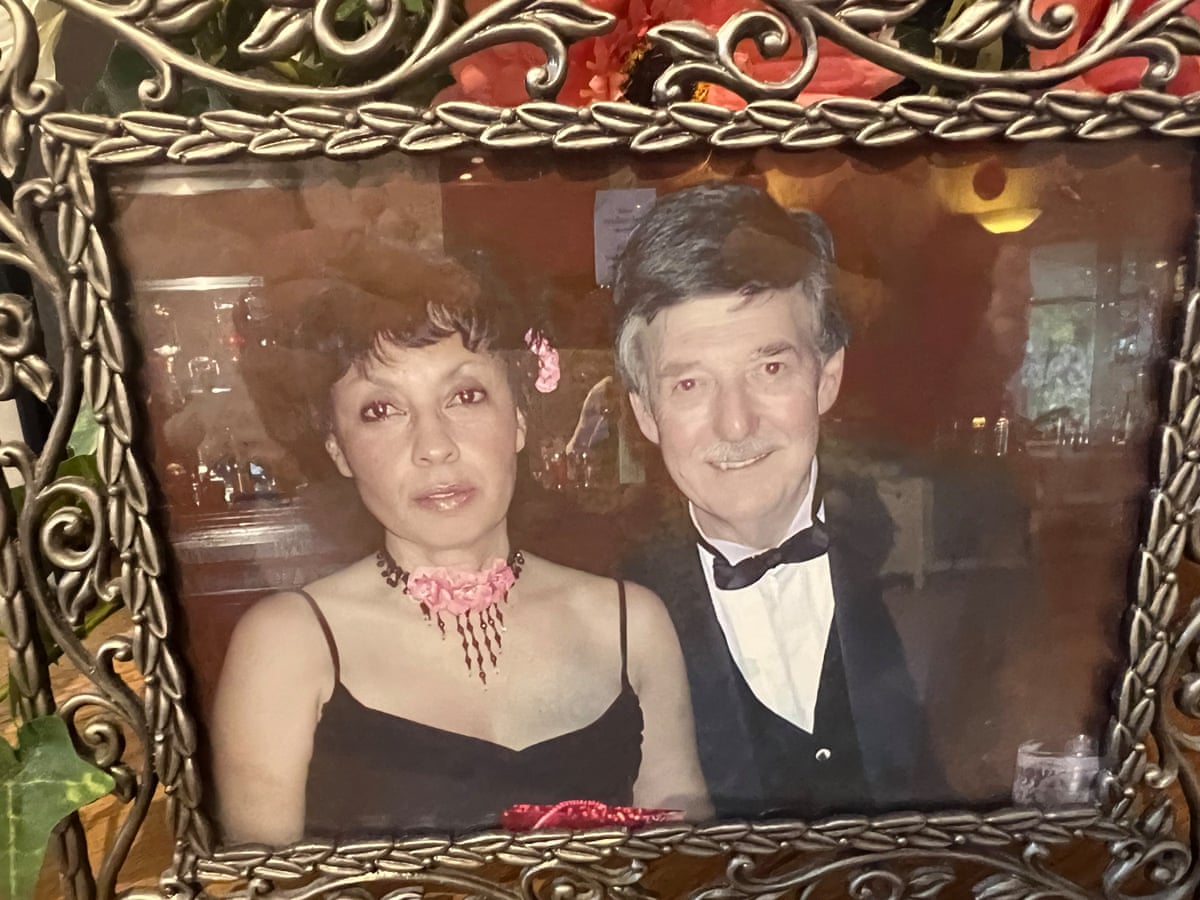 An old photo in a frame of Joyce Thomas and her now deceased husband, both dressed up for a party