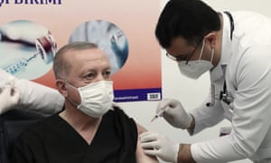 Turkey’s president Tayyip Erdoğan receives a Covid-19 vaccination, a day after Turkish authorities gave the go-ahead for the emergency use of the Covid-19 vaccine produced by China’s Sinovac