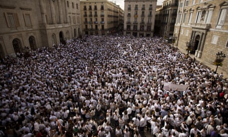 People rally in Sant Jaume Square in Barcelona.