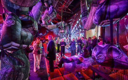 Visitors inside a contemporary art installation