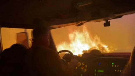 Firefighters escape Tamarack wildfire by driving through flames – video 